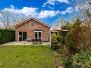 Holiday home in Baarland with fenced garden
